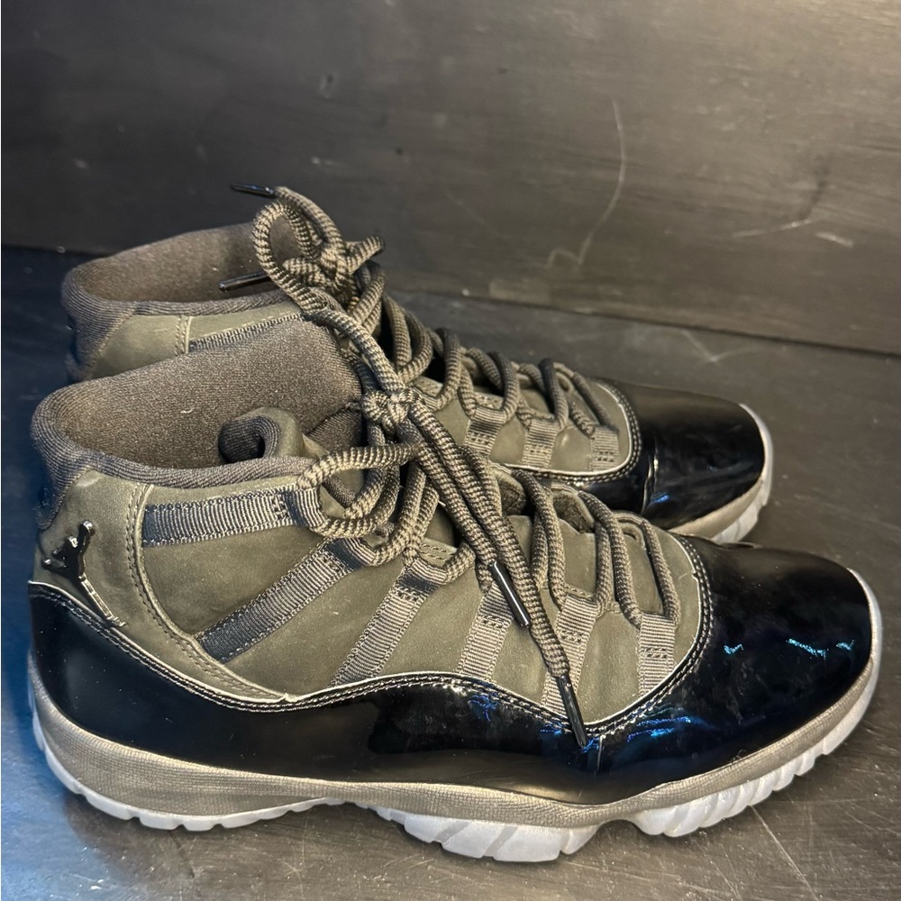 Jordan 11 Cap and Gown Black and Gray High-Top Sneakers